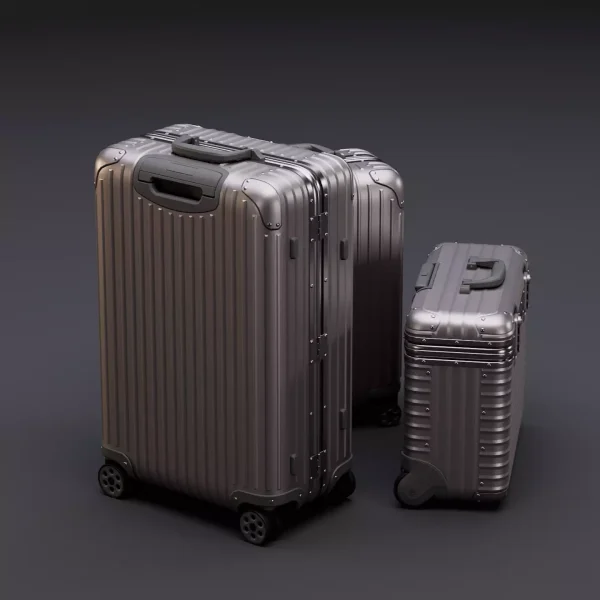 Product render of ribbed aluminium suitcases with spinner wheels, a large trolley in front and a small case beside it