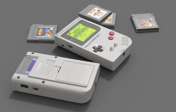 Angled 3D render of a Game Boy running Super Mario Land next to a second console seen from the back and four cartridges